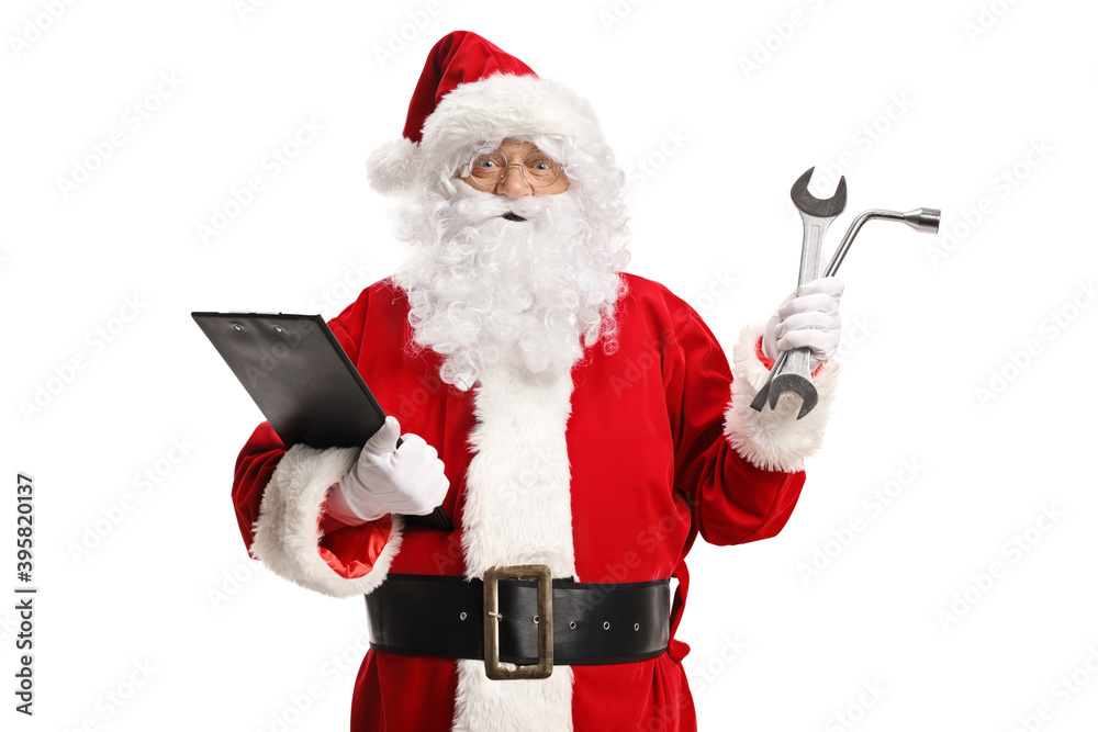 Santa Claus holding a clipboard and car repair tools Santa Claus holding a clipboard and car repair tools