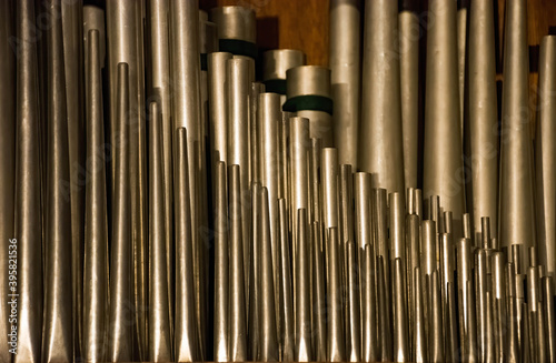 A historic pipe organ inside a church. Old musical instrument  religious music.