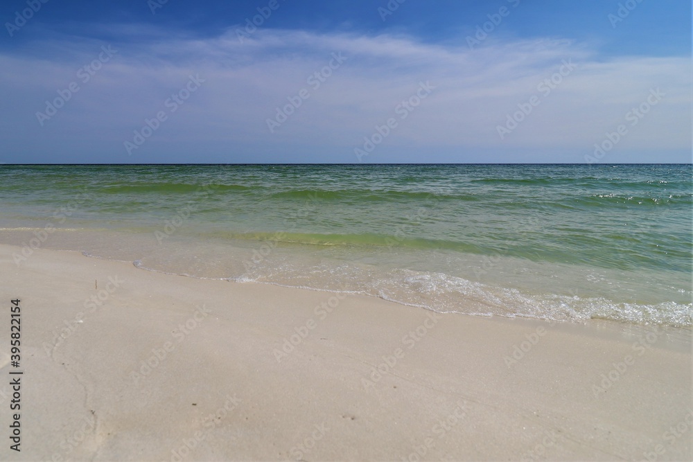 Beautiful ocean views from Florida beach, calm ocean waters, clear skies, clear skyline