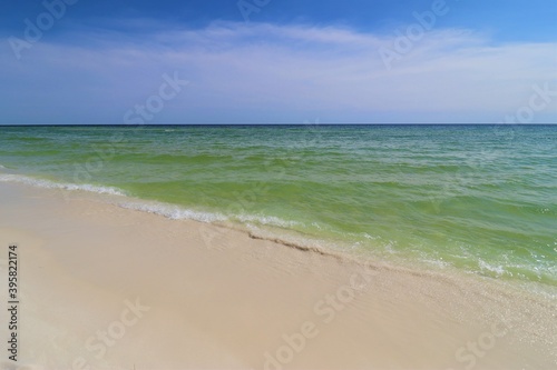 Beautiful ocean views from Florida beach  calm ocean waters  clear skies  clear skyline