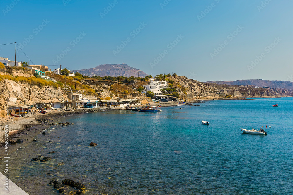 A view across the bay close to the Red Beach in Santorini in summertime