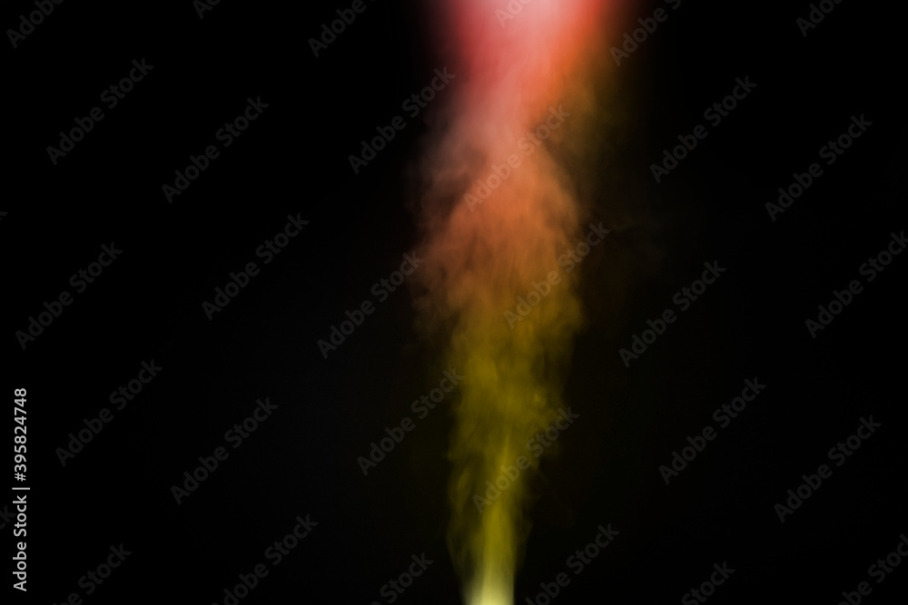 Colorful smoke explosion on black background