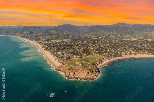 Aerial view of Point Dume State Park with sunset sky in Malibu, California. 