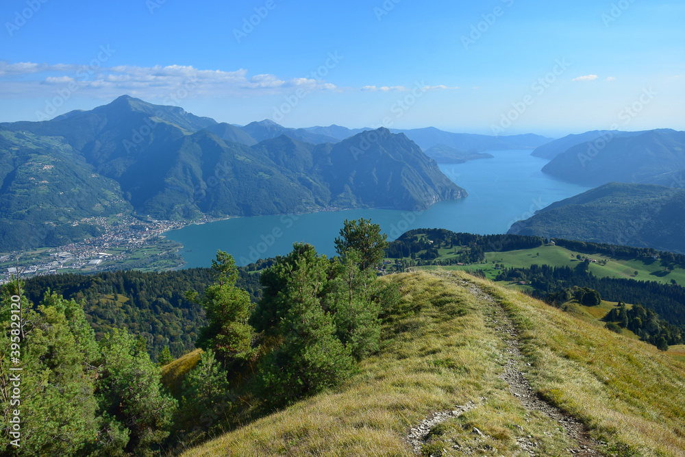 Obraz premium View from Mount Colombina to Lake Iseo, Mount Guglielmo and Corna Trentapassi. Bossico, Bergamo, Lombardy, Italy.