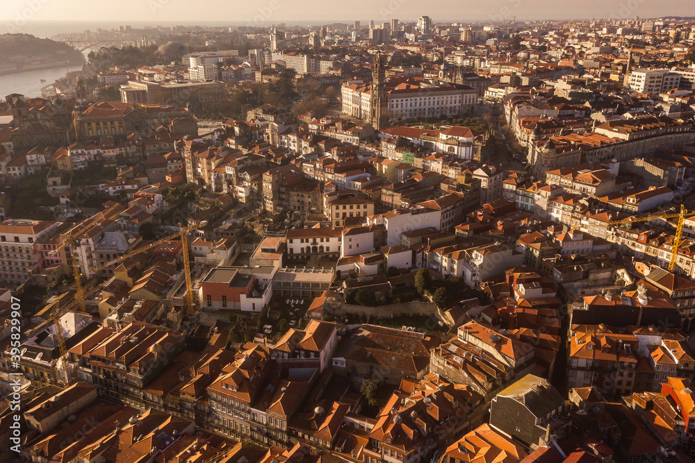 aerial view drone shot from above Porto, Portugal sunset sunlight sunshine Douru river old city 