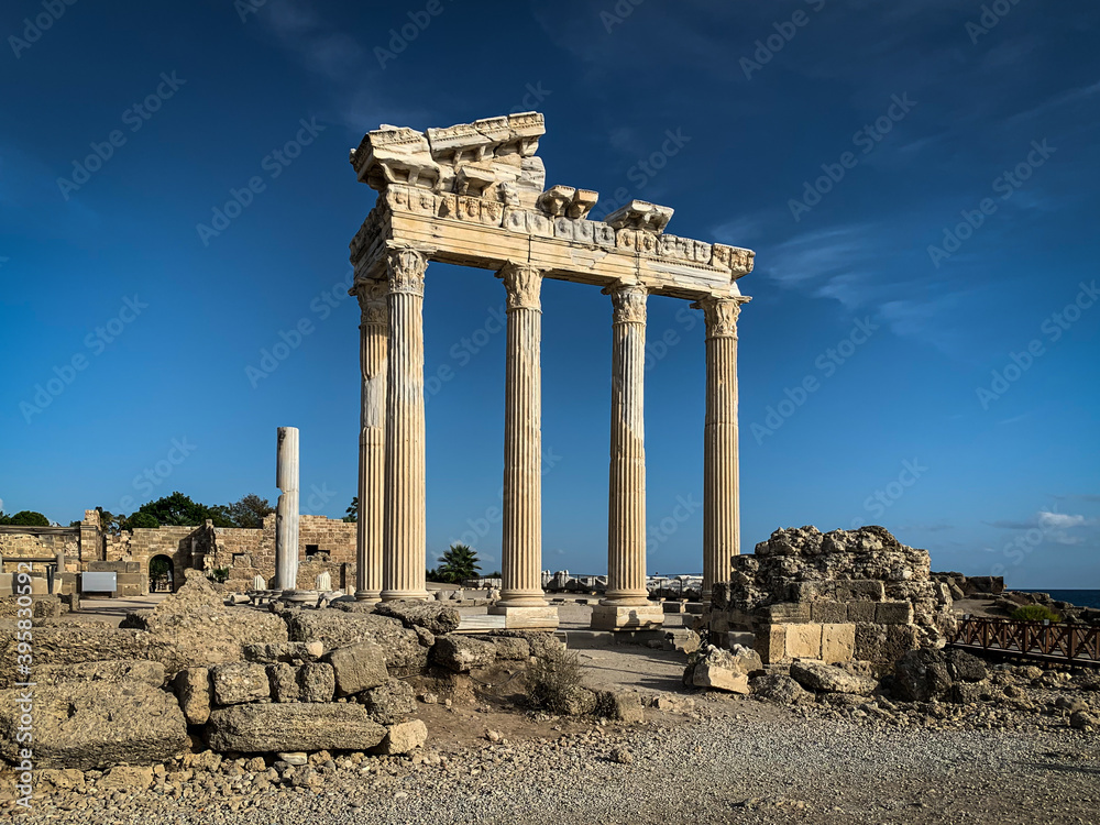 The ruins and columns of majestic Apollo temple in Side Antalya Turkey with a blue sunny sky background
