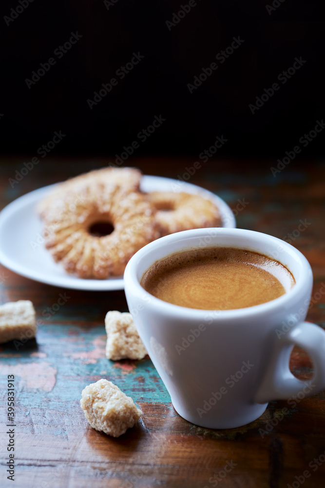 Cup of coffee on rustic wooden background. Close up. Cup of coffee on rustic wooden background. Close up.