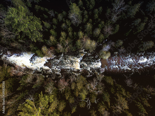 Aerial view of Papineau Creek rapids flowing in spring photo