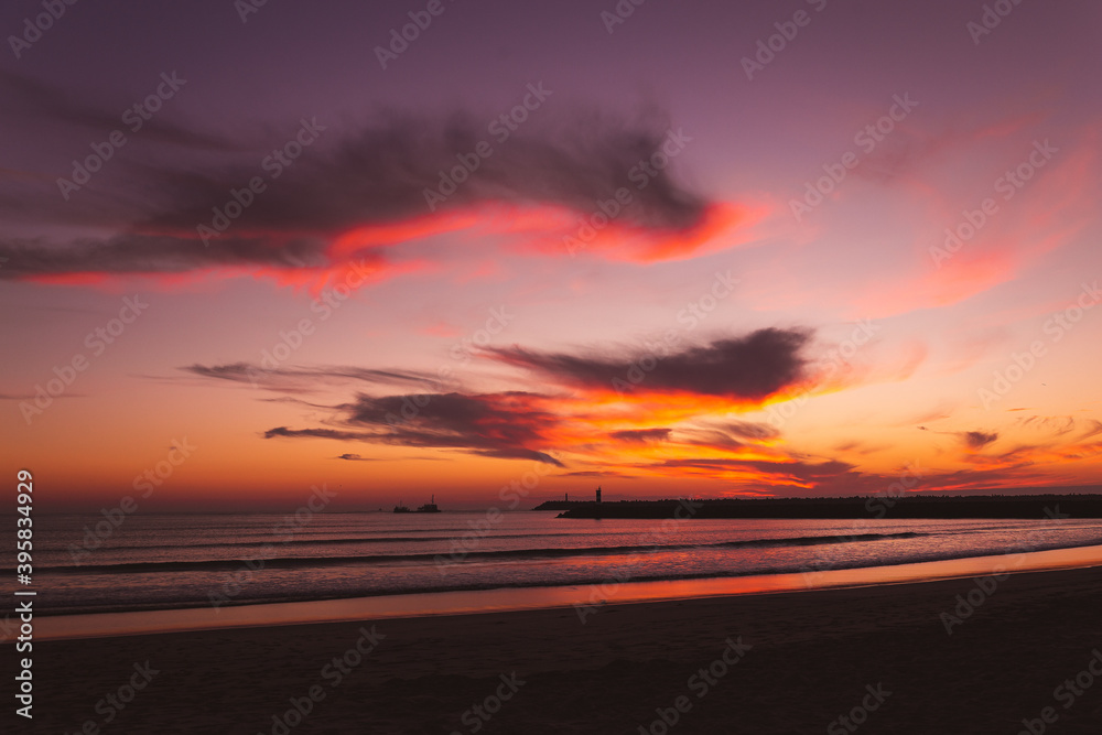 sunset on the beach in the Atlantic ocean Viana do Castelo Praia do Cabedelo Cabedelo beach colorful clouds