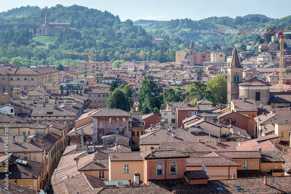 Roofs of residential buildings in historic part of Bologna city, Italy - view from terrace of St Petronius Basilica