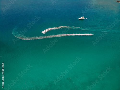 .Top view of the speedboat, leaving trace on the surface of the blue water; vessels concept.. © Semachkovsky 