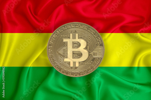 Bolivia flag, bitcoin gold coin on flag background. The concept of blockchain, bitcoin, currency decentralization in the country. 3d-rendering photo