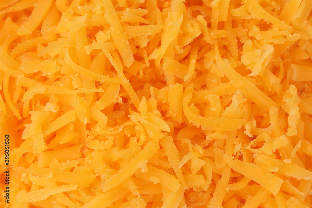 grated cheddar cheese background texture grated cheddar cheese background texture