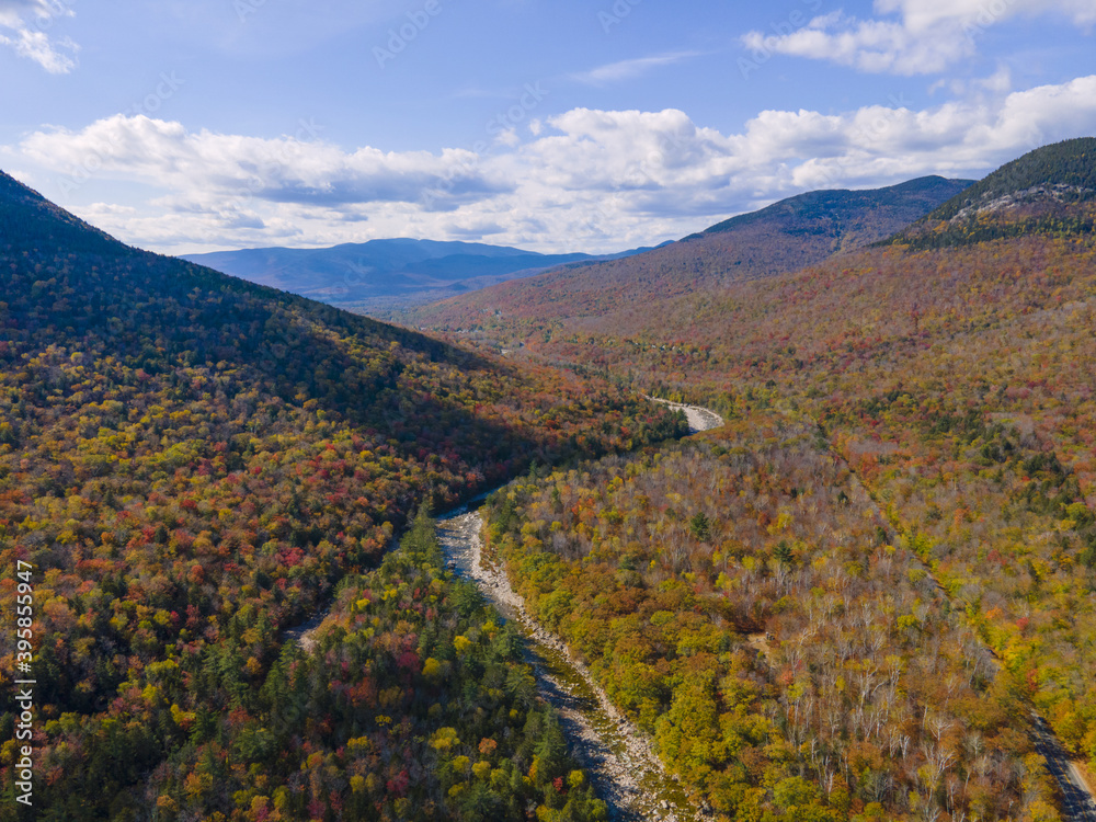 Aerial view of Pemigewasset River valley with fall foliage near Lincoln Woods on Kancamagus Highway in White Mountain National Forest, Town of Lincoln, New Hampshire NH, USA.