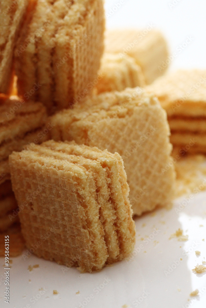 Lemon cream cube wafer on white background Lemon cream cube wafer on white background