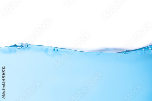 Blue water splashs wave surface with bubbles isolated on white background.