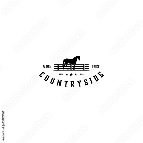 Horse Silhouette Behind Wooden Fence Paddock for Vintage Retro Rustic Countryside Western Country Farm Ranch Logo Design