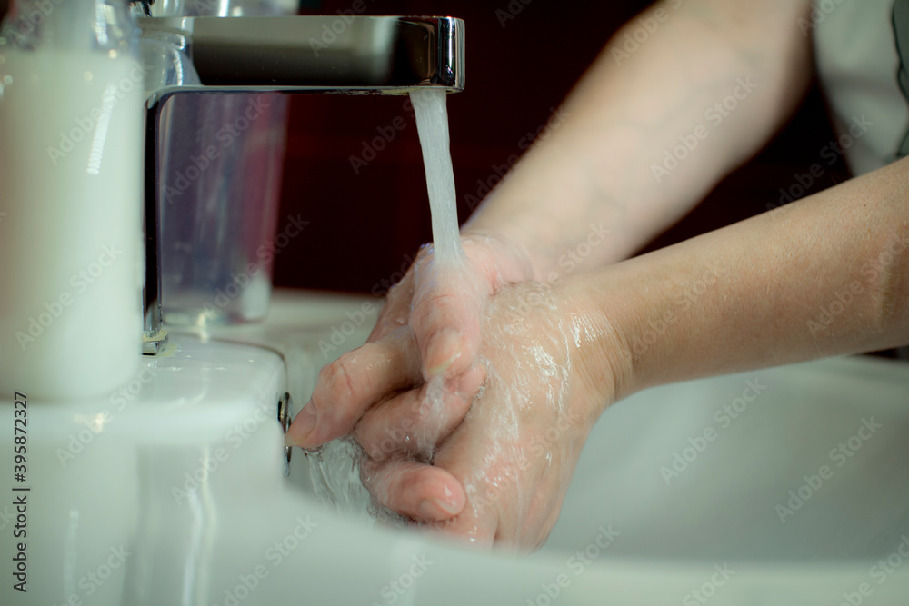 Prevention of coronavirus-destruction of pathogenic bacteria. Wash your hands with liquid soap Prevention of coronavirus-destruction of pathogenic bacteria. Wash your hands with liquid soap