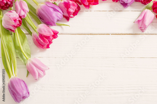 Fototapeta Naklejka Na Ścianę i Meble -  beautiful  tulips on white wooden background