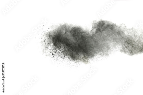 Black powder explosion isolated on white background.