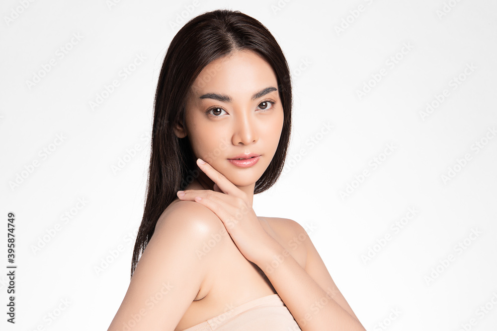 Beautiful young asian woman with clean fresh skin on white background, Face care, Facial treatment, Cosmetology, beauty and spa, Asian women portrait Beautiful young asian woman with clean fresh skin on white background, Face care, Facial treatment, Cosmetology, beauty and spa, Asian women portrait