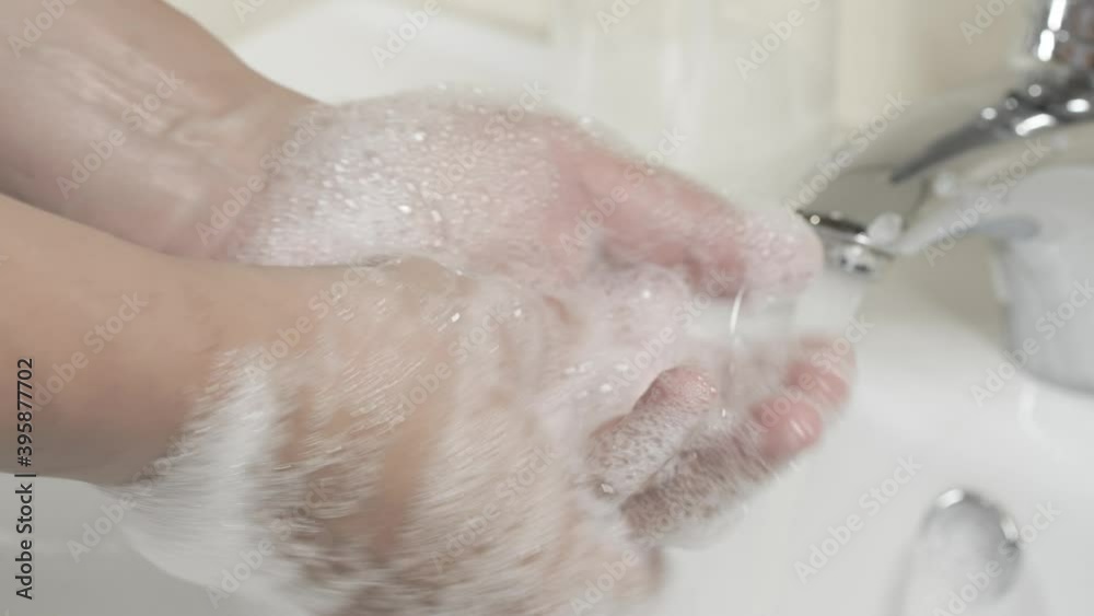 Man washing hands with sanitizer gel soap, prevention coronavirus Covid-19 virus Man washing hands with sanitizer gel soap, prevention coronavirus Covid-19 virus