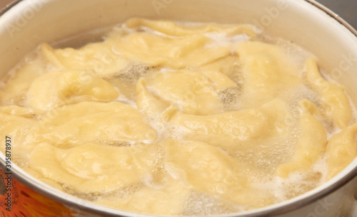 Dumplings cooked in a saucepan.
