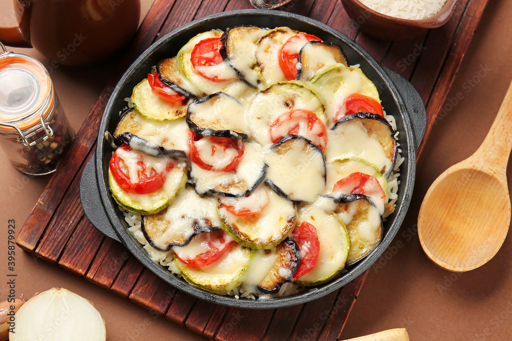 Baking dish with tasty rice casserole on table Baking dish with tasty rice casserole on table