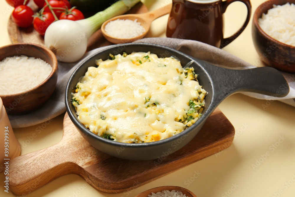 Baking dish with tasty rice casserole on table Baking dish with tasty rice casserole on table