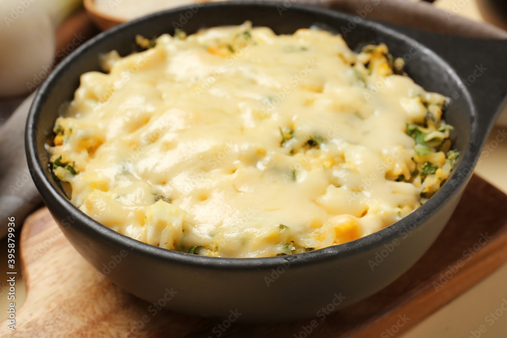 Baking dish with tasty rice casserole on table, closeup Baking dish with tasty rice casserole on table, closeup