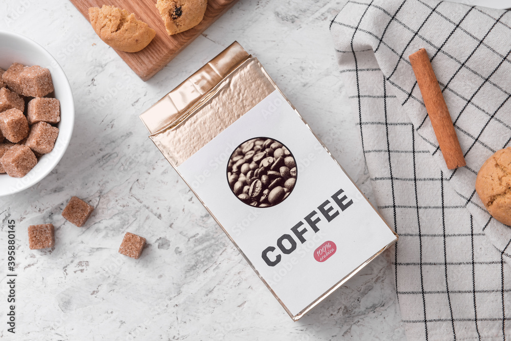 Pack with coffee and sugar on light table