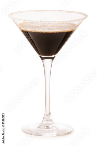 Glass of tasty espresso martini cocktail on white background