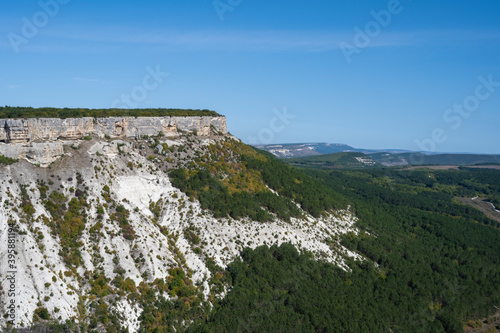 Panoramic mountain view from the cave city of Chufut-Kale in the Republic of Crimea, Russia. A clear Sunny day on September 28, 2020 photo