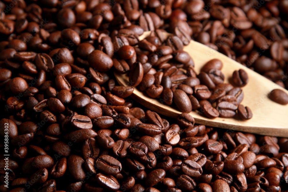 Coffee beans with a scoop