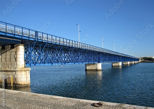 Railway bridge crossing the Arade river in Portimao, Algarve - Portugal 
