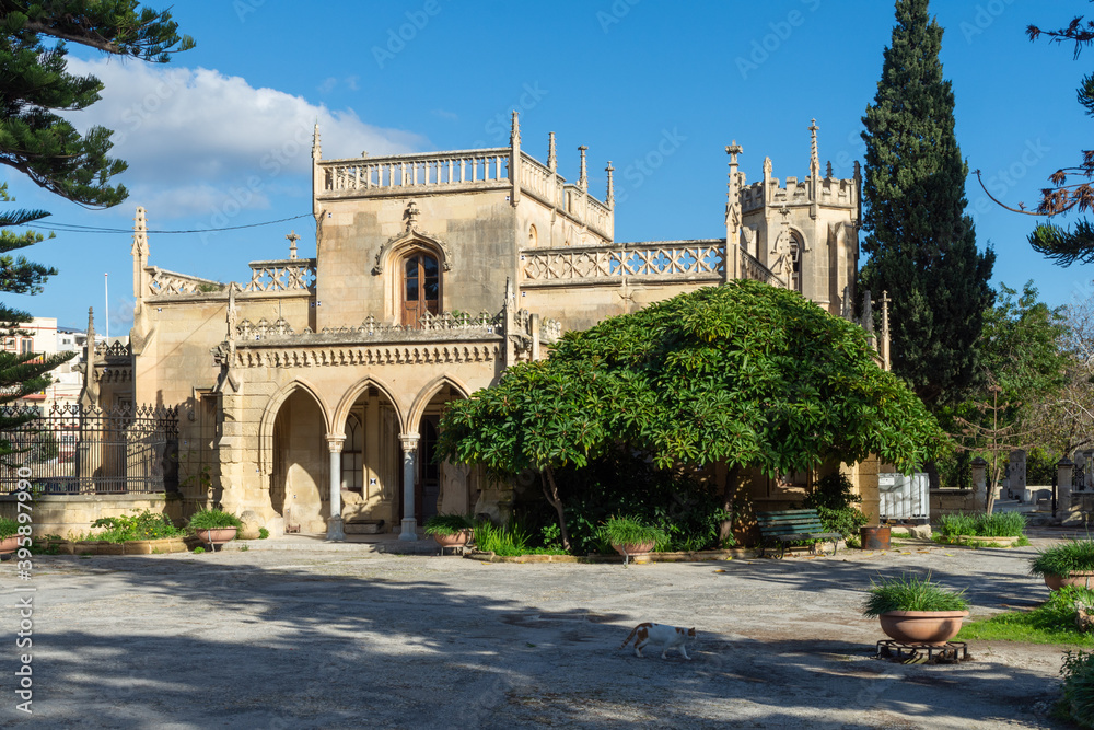 Paola, Malta - December 6th 2018: The gate house at the Santa Maria Addolorata Cemetery known simply as the Addolorata Cemetery.