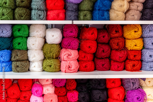 Close Up of yarn balls in shop many colours