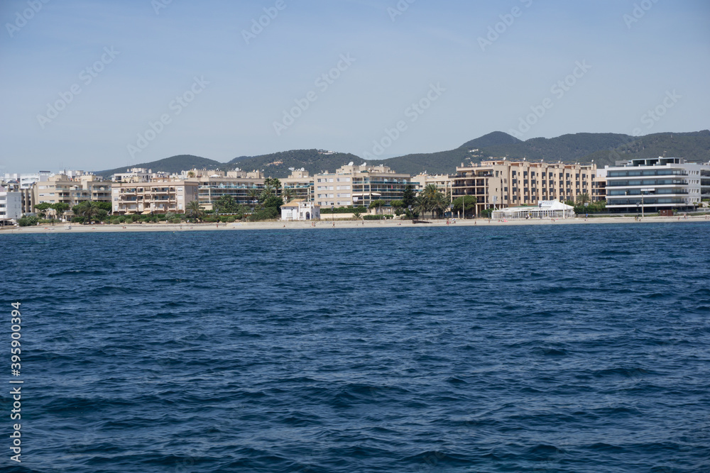 Naklejka premium The sea with small ships on the shores of the Spanish island of Ibiza