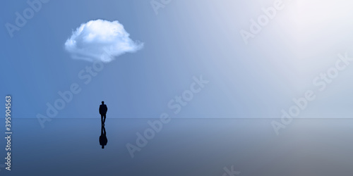 Silhouette of a man on the horizon. Reflection. Large space and cloud. Loneliness.