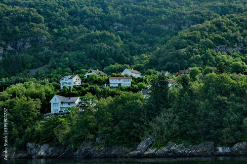 Scenic view of cottages in the woods on the shores of Osterfjord near Bergen, Norway