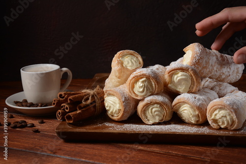Elegant french cream horn pastries. Delicious cream horns filled with vanilla cream