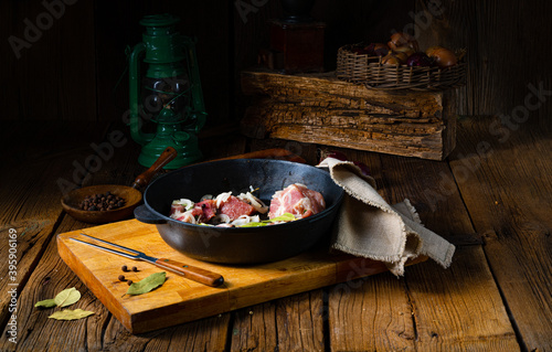 Raw East Frisian Snirtje roast with spices. photo