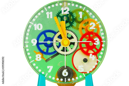 Dial of a transparent children s watch with colored gears. New Year s Eve symbol