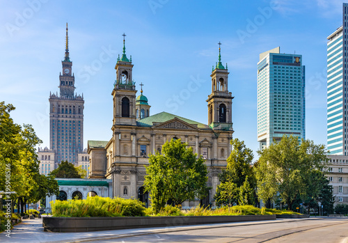 Downtown Srodmiescie district and Grzybowski square with All Saints church and Culture and Science Palace PKiN and Intercontinental hotel in Warsaw, Poland