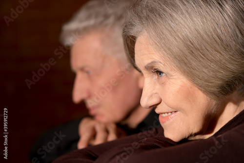 Close up shot of cheerful senior couple at home
