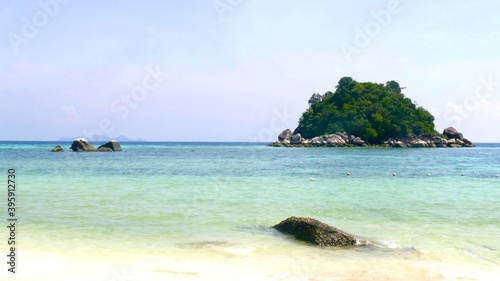 Beautiful paradise beach with white sand, turquoise water and rocks at Koh Lipe, Satun, Thailand. © Veruree
