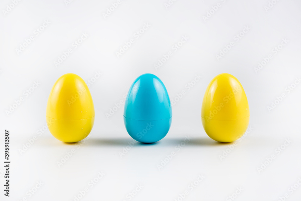 Three Colorful Plastic Easter Eggs on white background Three Colorful Plastic Easter Eggs on white background
