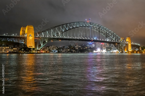 Sydney, New South Wales, Australia ; The Sydney Harbor Bridge illuminated at night.