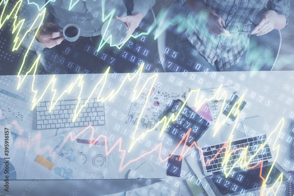 Double exposure of man and woman working together and financial chart hologram drawing. market analysis concept. Computer background. Top View. Double exposure of man and woman working together and financial chart hologram drawing. market analysis concept. Computer background. Top View.