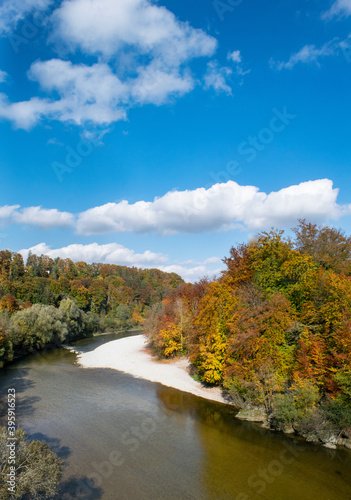 Verical aerial image of Isar river in the season of fall or autumn
